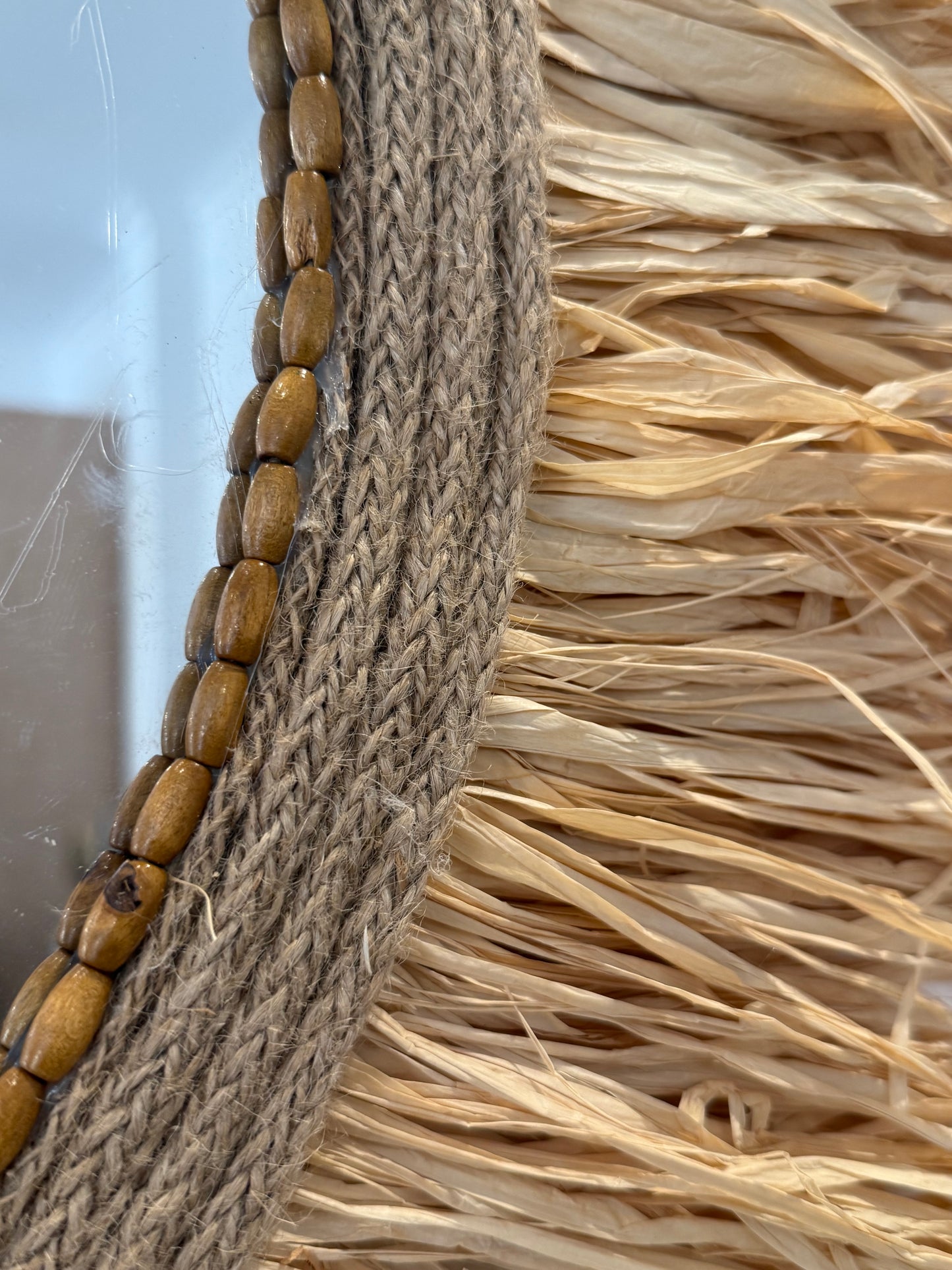 Raffia mirrors