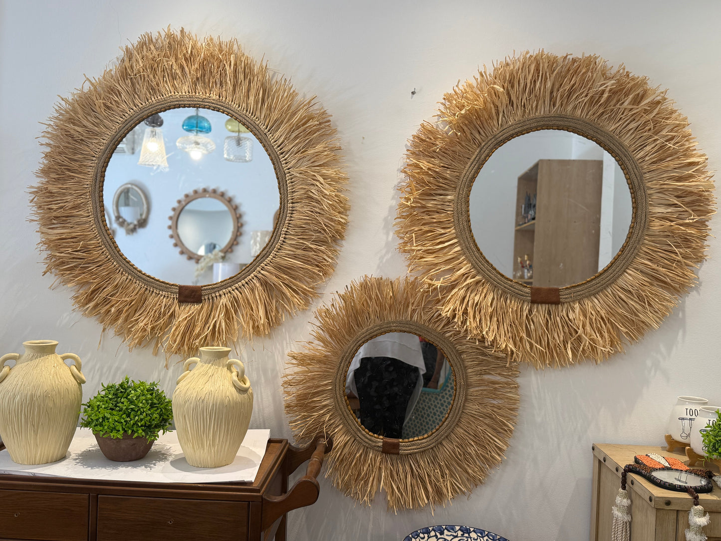 Raffia mirrors