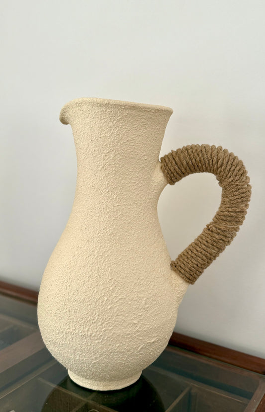 Pottery jug with jute